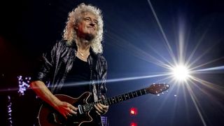 Brian May of Queen + Adam Lambert performs at Little Caesars Arena on October 10, 2023 in Detroit, Michigan. 