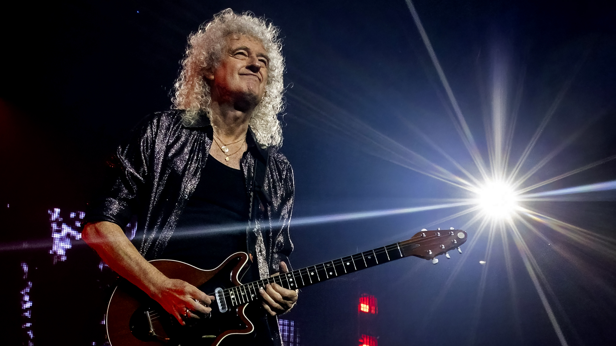Brian May of Queen + Adam Lambert performs at Little Caesars Arena on October 10, 2023 in Detroit, Michigan.