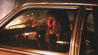 ali larter screaming in a car in a still from Final Destination