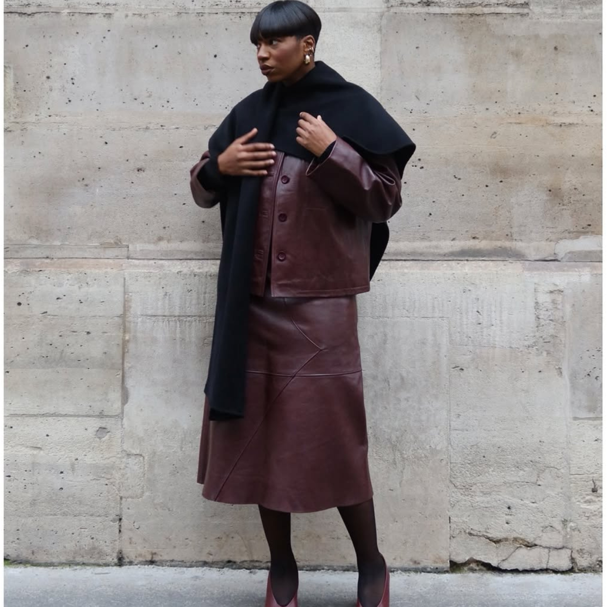 Lo&iuml;cka Gr&acirc;ce wears a burgundy leather co-ord