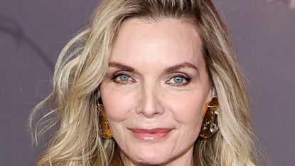 michelle pfeiffer on a gray background