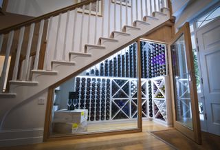 Sorrells Wineracks Wine Room used as an under stair storage idea