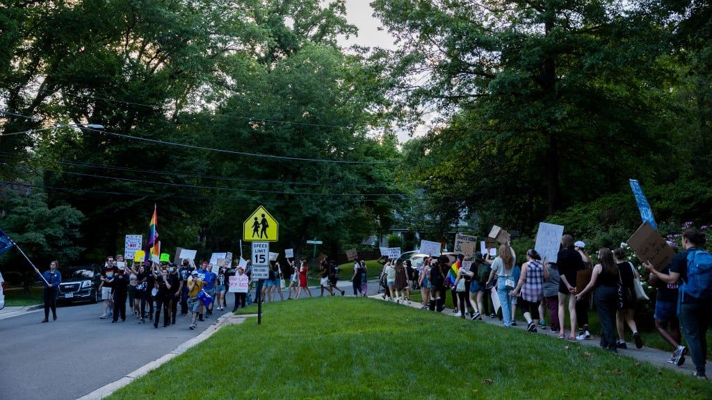 Abortion rights protesters march in front of Supreme Court Chief Justice John Roberts&amp;#039; house in Maryland.