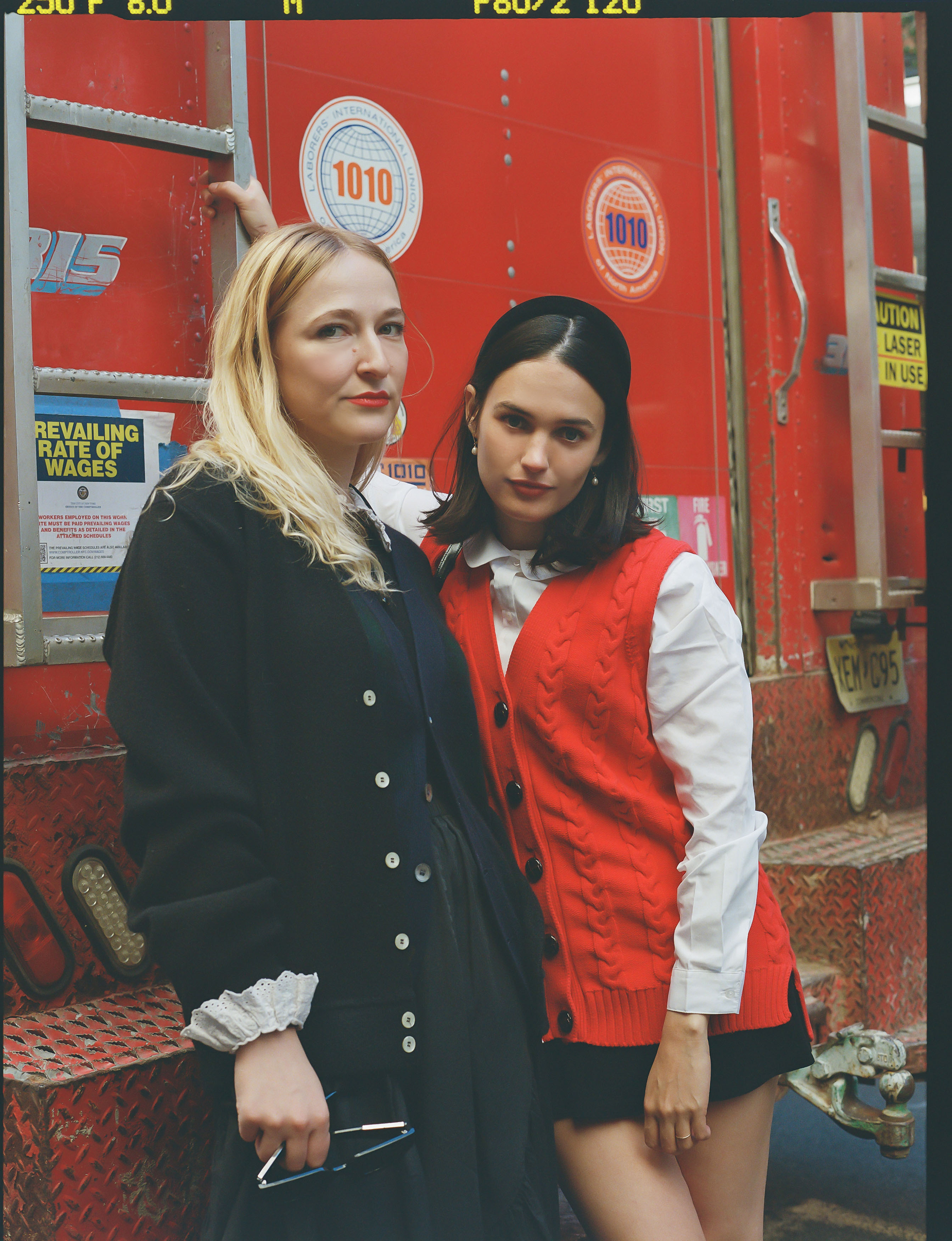 forever magazine cofounders anika jade levy and nat ruiz pose together in front of a red firetruck in new york city