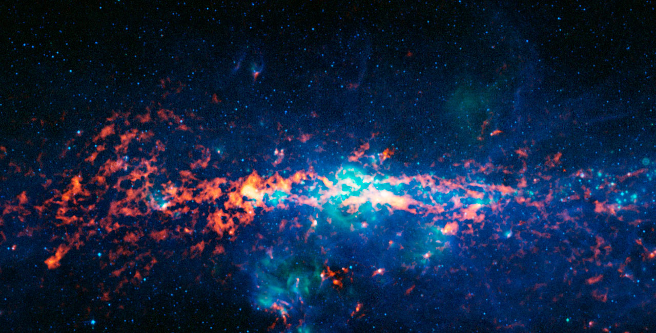 Farbkompositbild des galaktischen Zentrums und Sagittarius B2 aus der ATLASGAL-Durchmusterung.  Im Zentrum der Milchstraße befindet sich ein supermassereiches Schwarzes Loch mit einer Masse, die mehr als vier Millionen Mal so groß ist wie die Masse unserer Sonne.  Es ist etwa 25.000 Lichtjahre von der Erde entfernt.  Sagittarius B2 (Sgr B2) ist eine der größten molekularen Gaswolken in der Milchstraße.