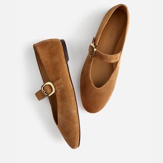 A cutout of suede mary jane stylet ballet flats in tan