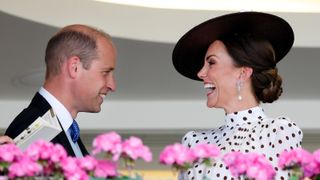 Prince William, Duke of Cambridge and Catherine, Duchess of Cambridge watch the racing from the Royal Box as they attend day 4 of Royal Ascot at Ascot Racecourse on June 17, 2022 in Ascot, England.