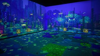 A wide shot of an underwater room with multiple chests.