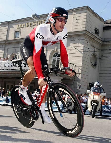 Cancellara pushes out of the turn.