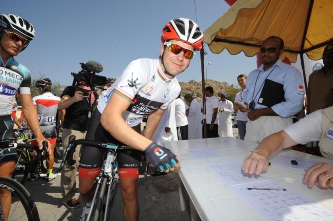 Tony Gallopin holds the white jersey as best young rider behind Sagan