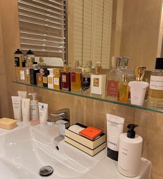 fragrances lined up along sink