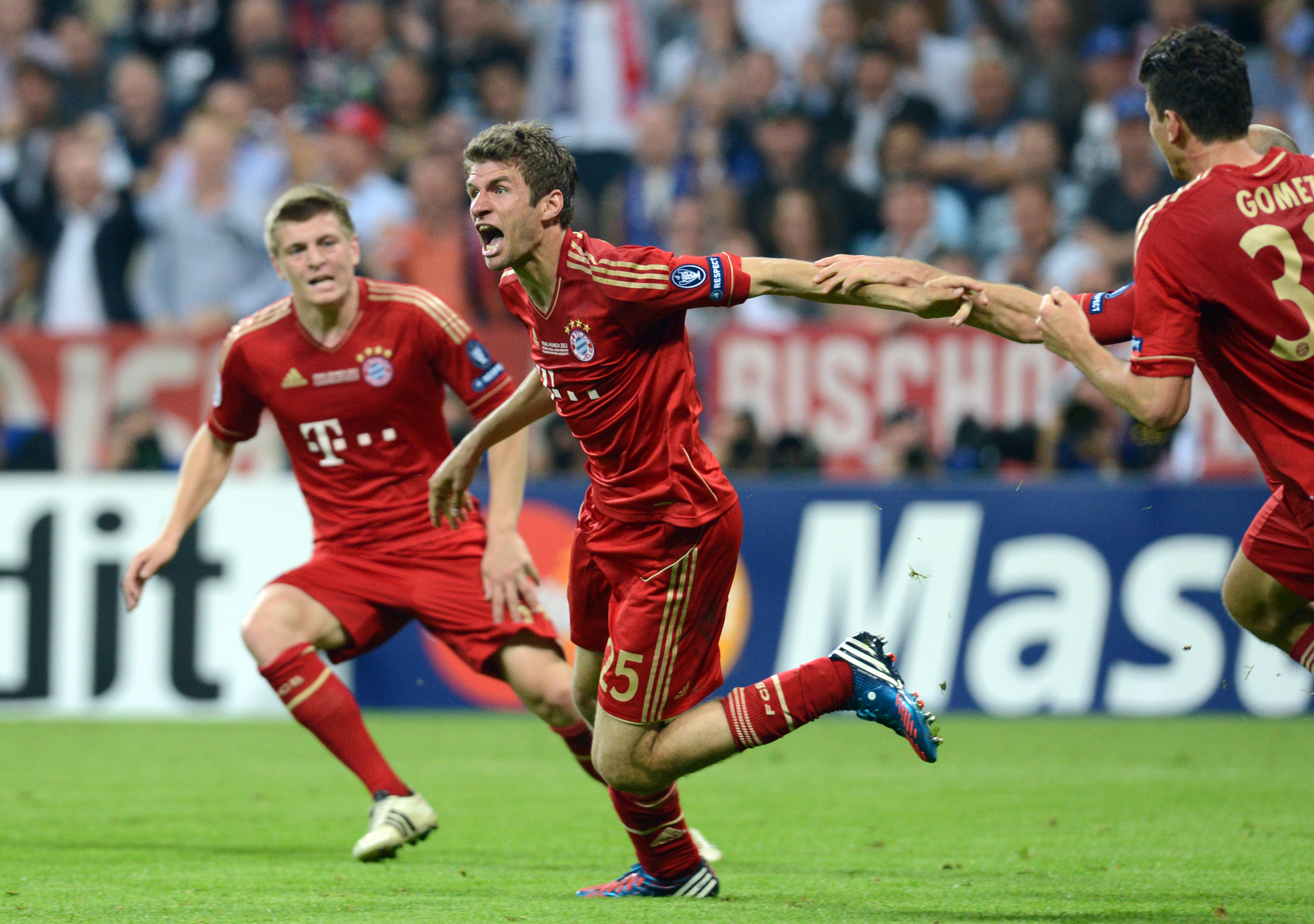 Thomas Muller celebrates with his Bayern Munich team-mates after scoring the opening goal in the 2012 Champions League final against Chelsea.