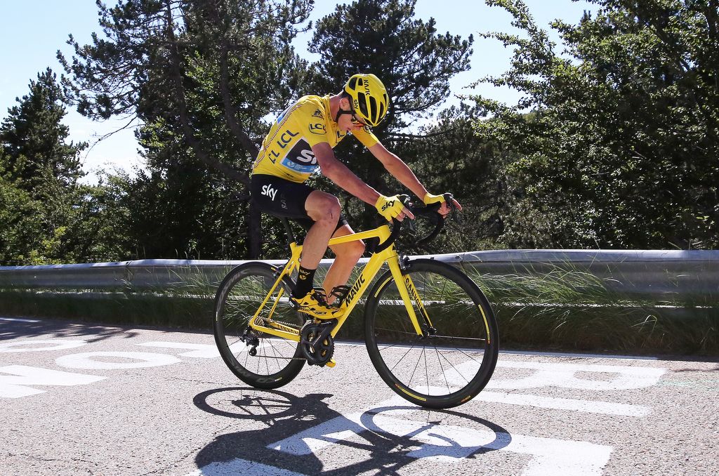 Chris Froome (Team Sky) tries to make sense of the neutral spares bike