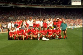 Nottingham Forest players pose with the trophy after their League Cup final win over Oldham Athletic in March 1990.