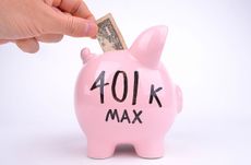 picture of person putting money is a piggy bank with "401k Max" written on it