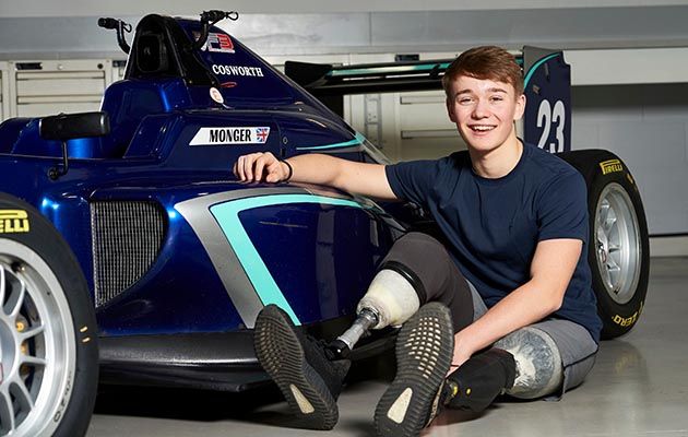 Billy Monger, Carlin Racing Factory, Farnham. Shows Billy Monger with car