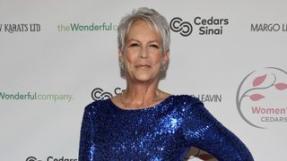jamie lee curtis with a short pixie crop hairstyle which is a youthful hairstyle
