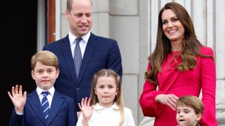 Prince William and Princess Catherine, Princess Charlotte of Cambridge, Prince Louis of Cambridge and Catherine, Duchess of Cambridge stand on the balcony of Buckingham Palace following the Platinum Pageant on June 5, 2022 in London, England.