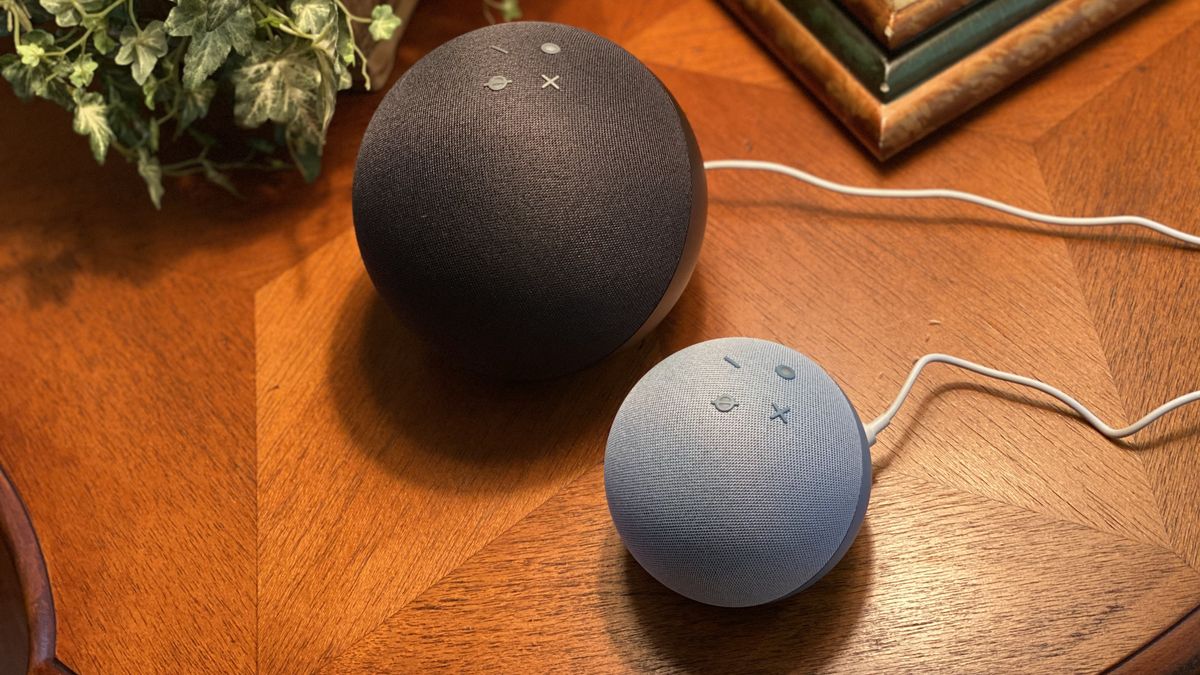 Amazon Echo and Echo Dot smart speakers on table