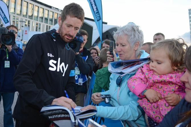 Bradley Wiggins (Team Sky) signing autographs for fans