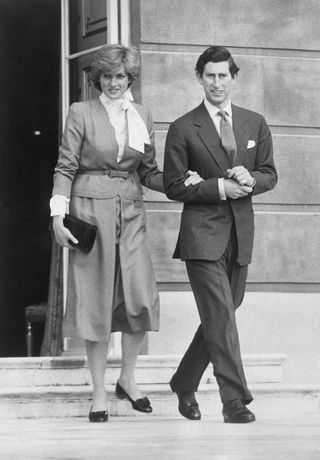 Princes Diana and Prince Charles leave Buckingham Palace after publicly announcing their engagement.