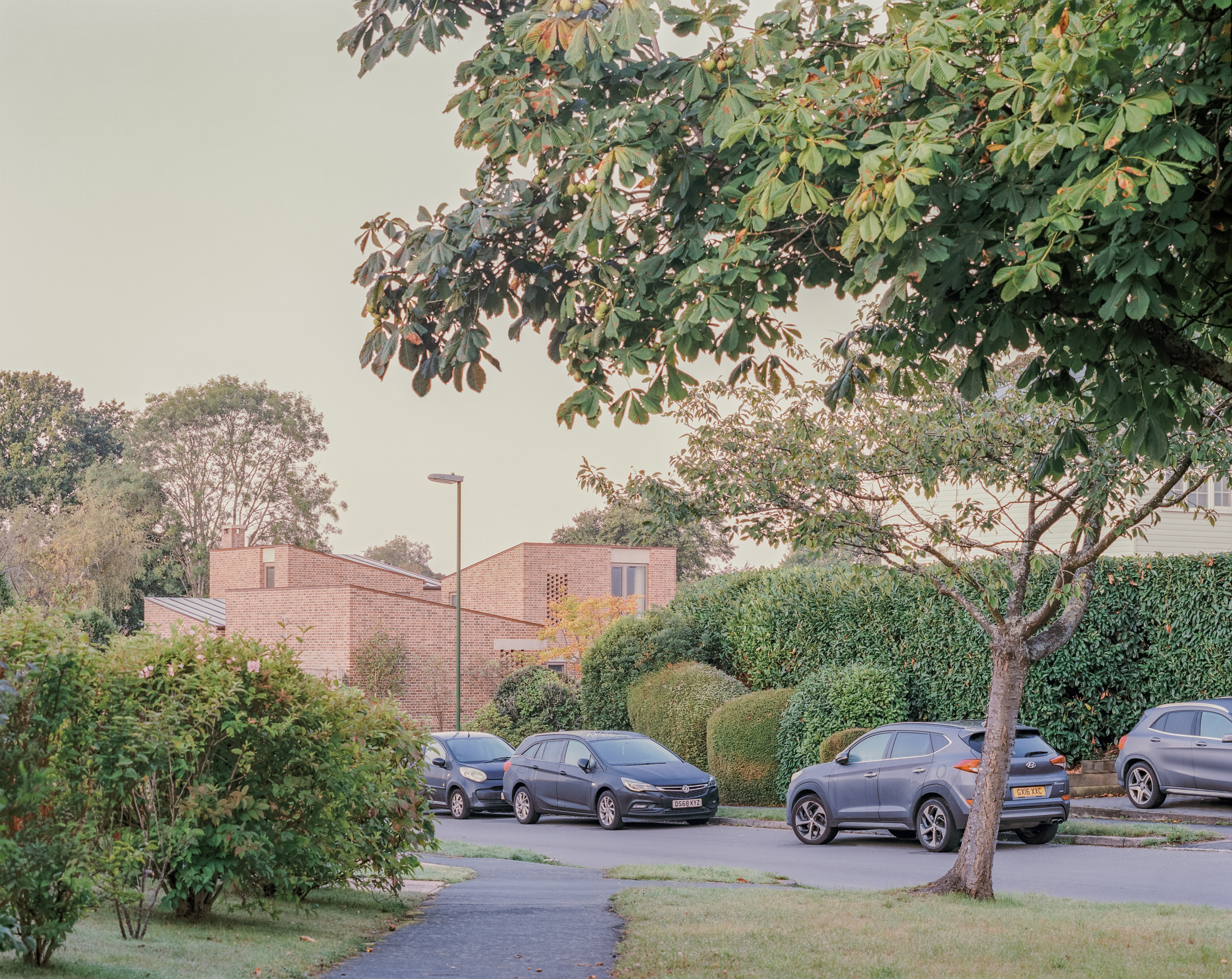 The new house in its village context