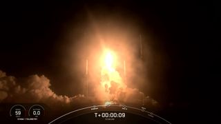 A SpaceX Falcon 9 rocket carrying 60 Starlink internet satellites launches from Cape Canaveral Space Force Station in a predawn liftoff on March 24, 2021.
