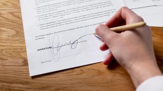 Sales contract being signed