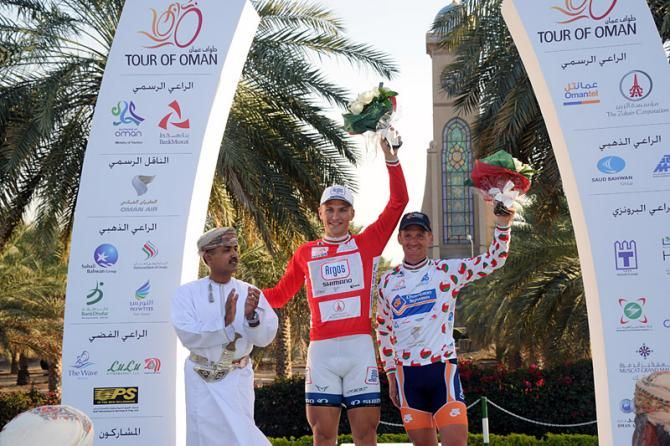 Tour of Oman race leader Marcel Kittel (Team Argos-Shimano) in the red jersey while Bobbie Traksel (Champion System) sports the most aggressive rider's jersey.