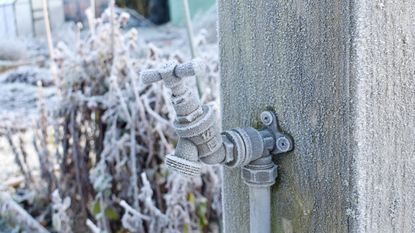 A frozen outdoor faucet