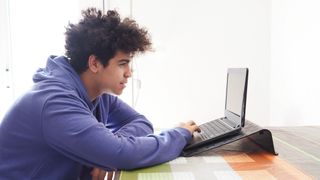 Boy using laptop