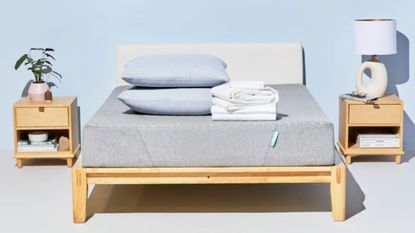 Siena mattress on bed frame with bedding on