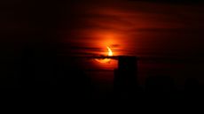 An eerie solar eclipse seen during the early hours of the morning in New York, on June 10, 2021. 