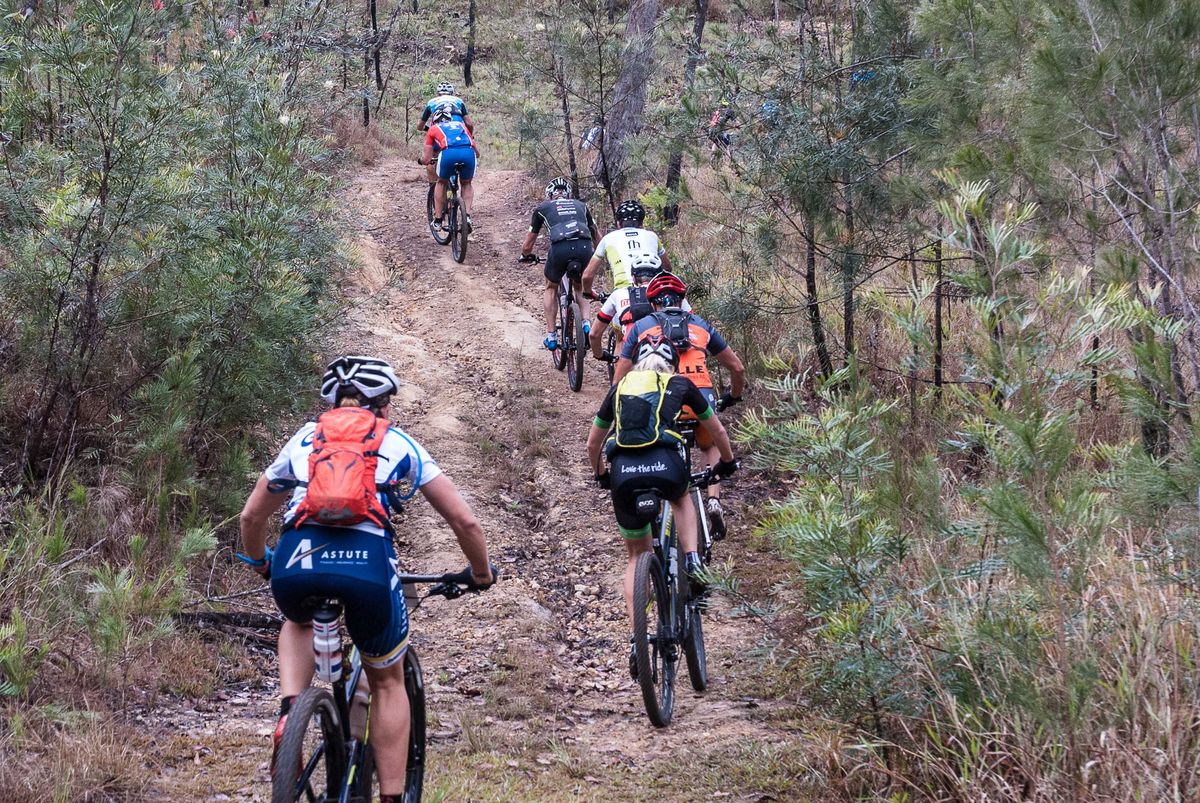 Tough day in the saddle: rain, mud, steep climbs - Sarah White (left) and Regina Genser (right) on track together early in the race
