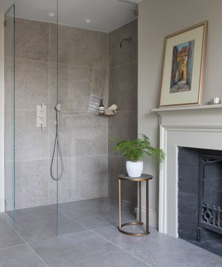 Large gray bathroom tiles by CP Hart on a shower wall and floor