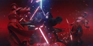 Rey and Kylo fighting in Snoke's Throne Room