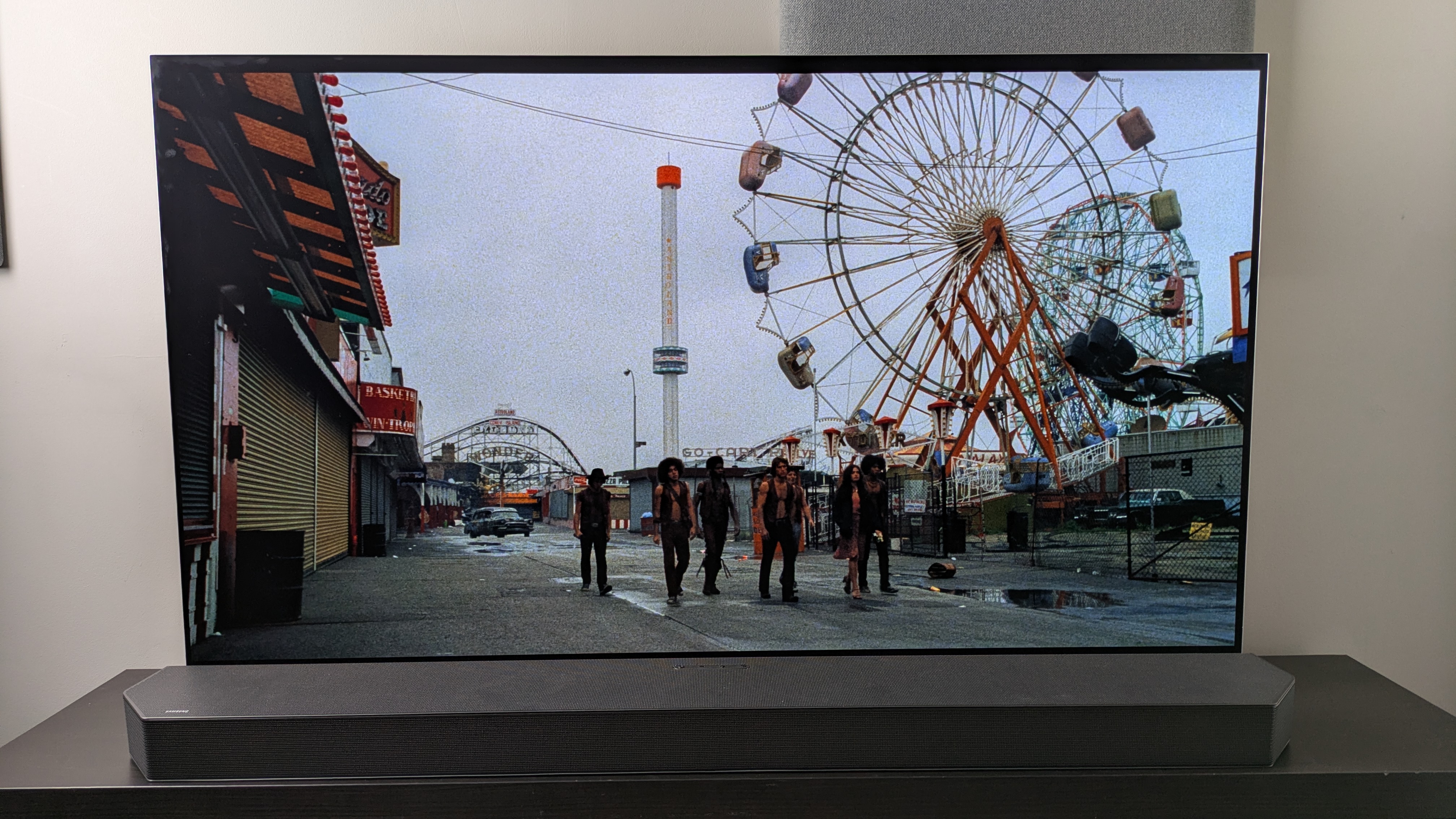 The Warriors 4K Blu-ray Paramount version on LG G5 showing The Warriors walking through funfair in the day 