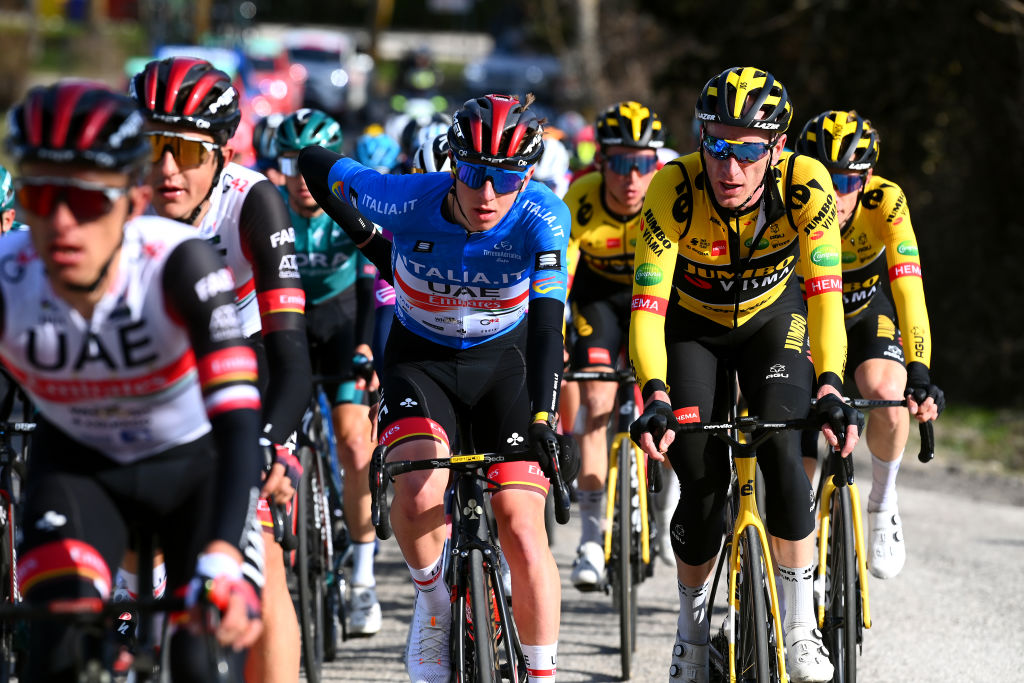 CARPEGNA ITALY MARCH 12 LR Tadej Pogacar of Slovenia and UAE Team Emirates Blue Leader Jersey and Jos Van Emden of Netherlands and Team Jumbo Visma compete during the 57th TirrenoAdriatico 2022 Stage 6 a 215km stage from Apecchio to Carpegna 746m TirrenoAdriatico WorldTour on March 12 2022 in Carpegna Italy Photo by Tim de WaeleGetty Images