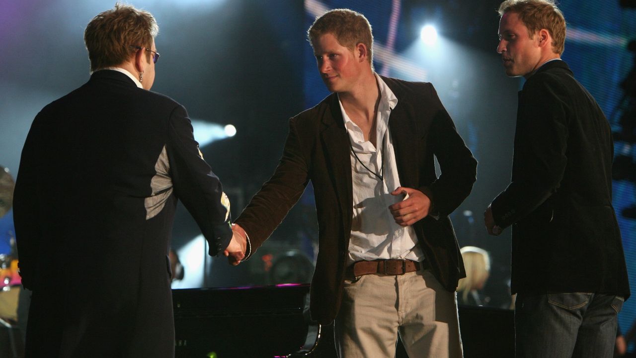 Sir Elton John, HRH Prince Harry and HRH Prince William on stage during The Concert For Diana held at Wembley Stadium on July 1, 2007 in London. The concert marked the 10th anniversary of Princess Diana&#039; s death with an event to celebrate her life.