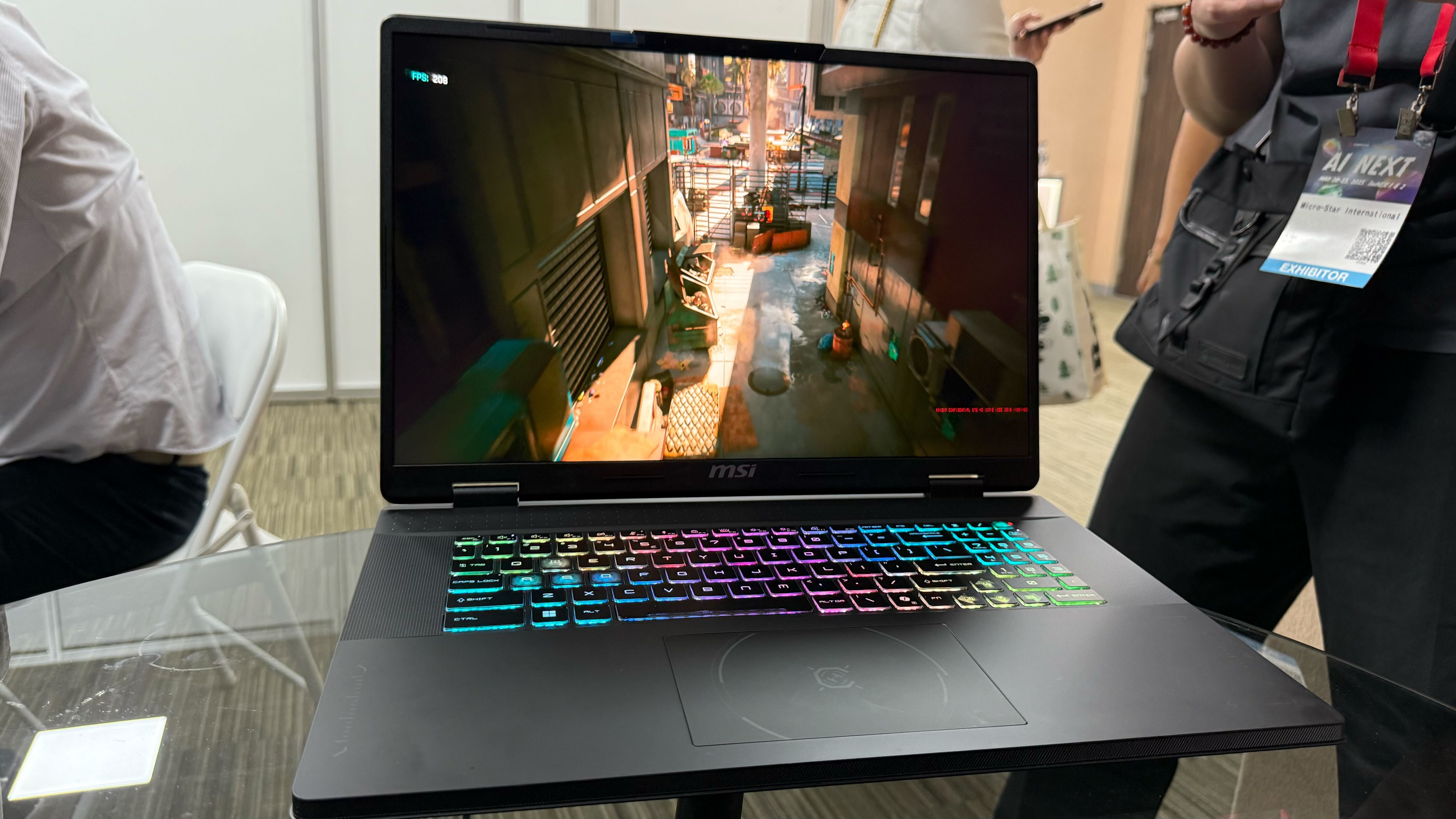 MSI Crosshair 18 HX gaming laptop with an RTX 5070, being benchmarked at Computex in Taipei.