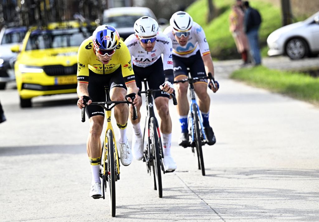 Belgian Wout van Aert of Team Visma-Lease a Bike, Belgian Tim Wellens of UAE Team Emirates and Spanish Oier Lazkano of Movistar Team pictured in action during the Kuurne-Brussels-Kuurne one day cycling race, 196,4 km from Kuurne to Kuurne via Brussels, Sunday 25 February 2024. BELGA PHOTO JASPER JACOBS (Photo by JASPER JACOBS / BELGA MAG / Belga via AFP)
