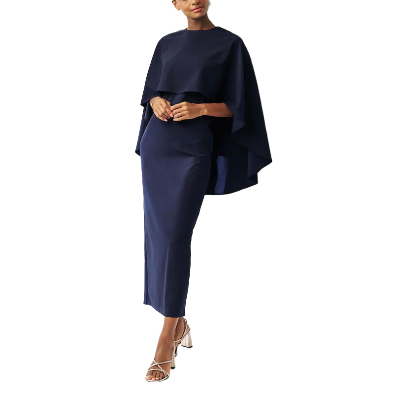 model wearing a navy Next cape dress