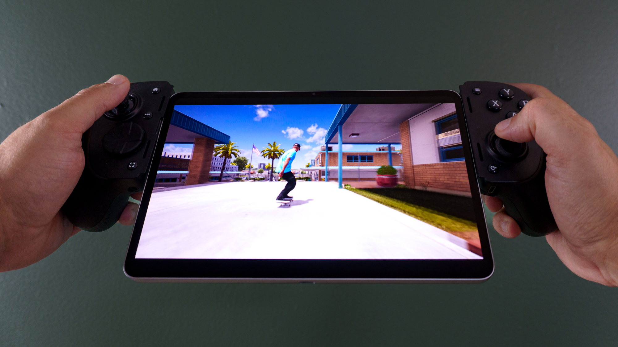 The RedMagic Astra 2 gaming tablet with the Razer Kishi Ultra telescoping controller attached on either side