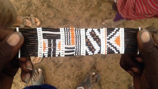 The Partners worked with the people in Enkiito, Kenya, to create bracelets with the brand's pattern
