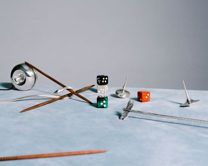 Georg Jensen games including dice, spinning top and Mikado