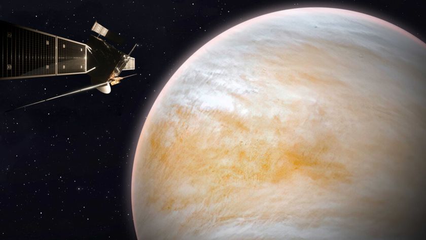 An illustration showing a spacecraft with various antennae floating in front of the orange and white swirling planet of Venus