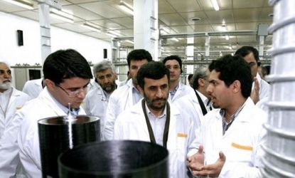 President Mahmoud Ahmadinejad visits a uranium enrichment facility in 2008