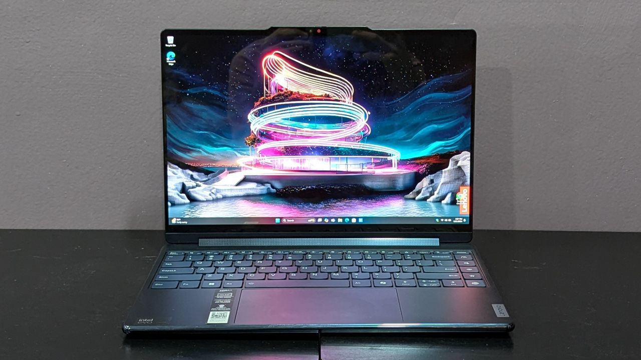 Lenovo Yoga 9i Gen 9 open on a black table