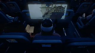 Un utilisateur de Vision Pro regardant un film de pirate dans un siège d'avion