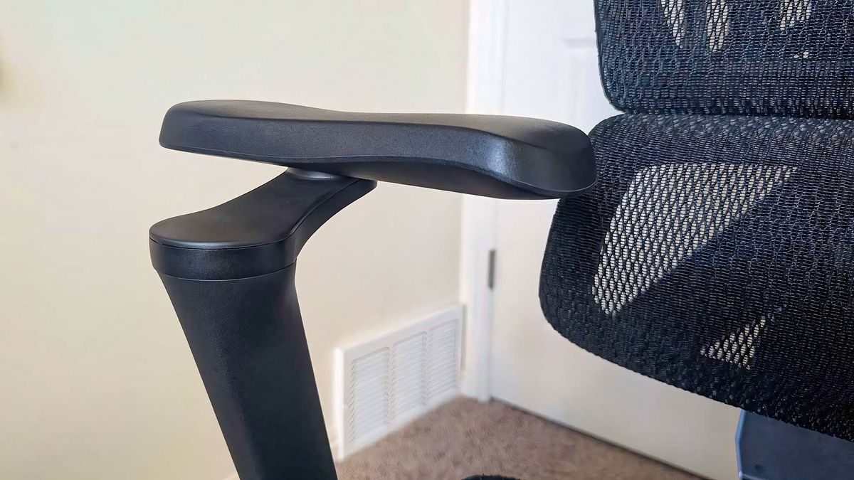 Closeup of a 5D armrest while it's rotated back and sideways.